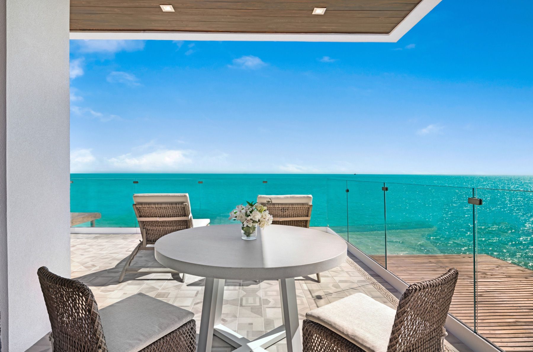 Additional seating on the master bedrooms private balcony.